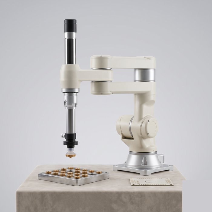 Robô SCARA de mesa fazendo pick-and-place de peças pequenas numa linha